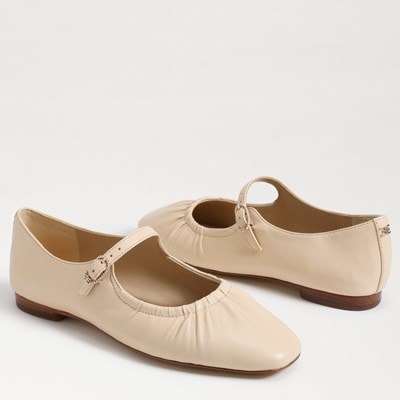 Cream hotsell flat shoes